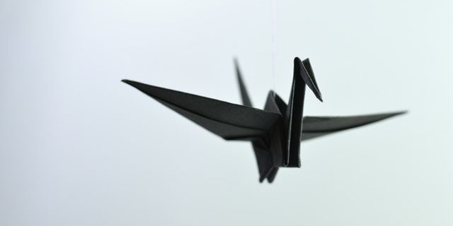 Origami pelican to illustrate above the fold