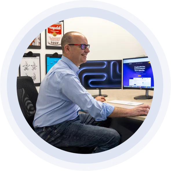 Matt Boden - Co-founder working at a computer.